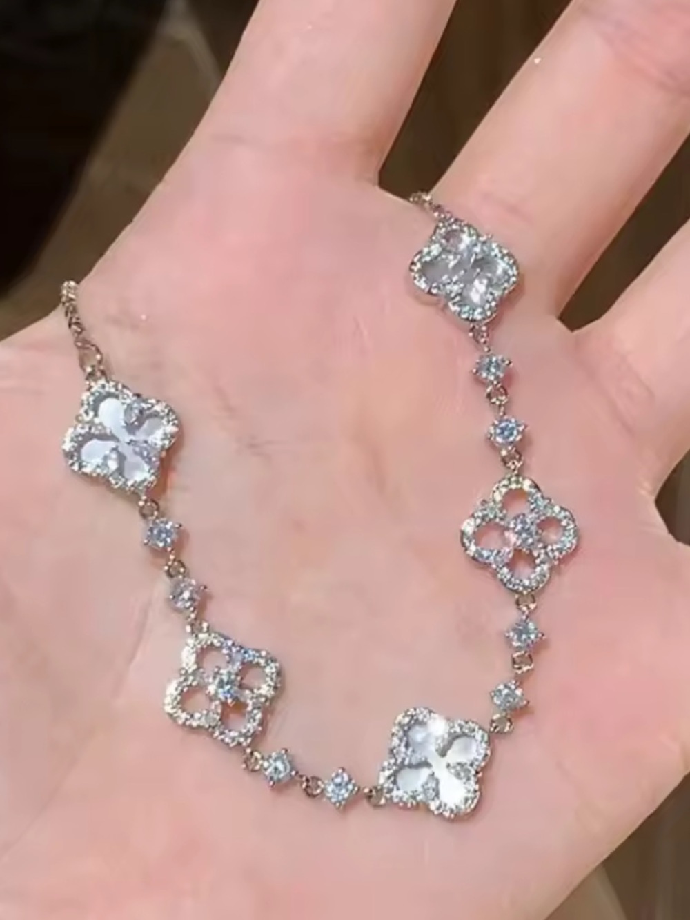 Silver Clover Link Bracelet with Clear Stones